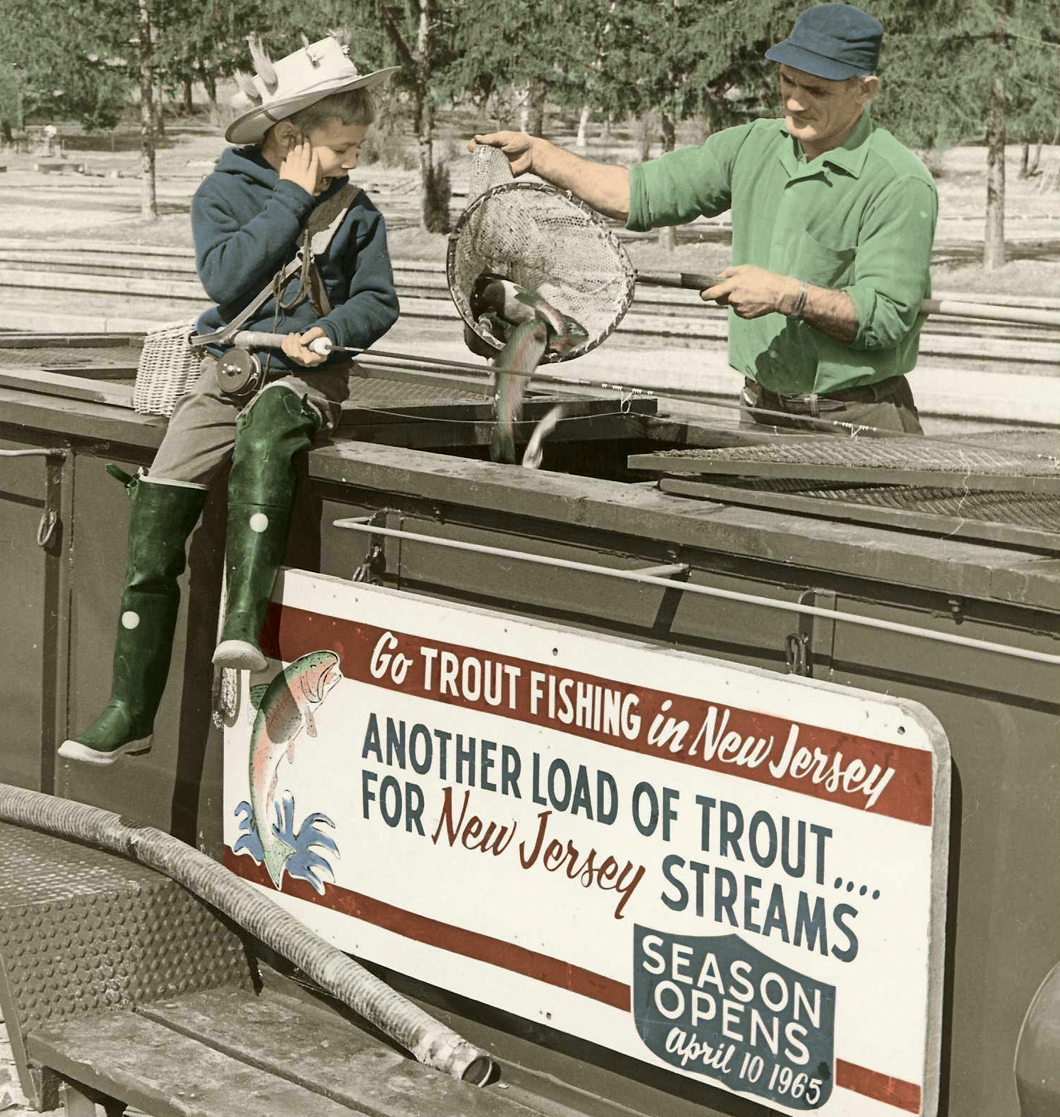 Photo of Man and Child with Trout Stocking Truck from 1965