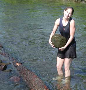 H.S. Girl with large rock