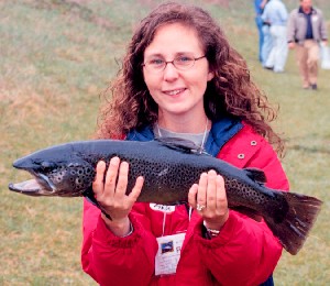 Lady with huge brown trout