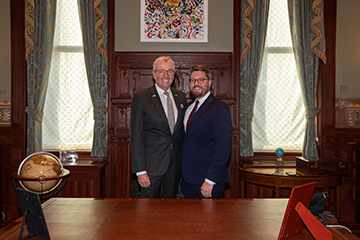 Governor Phil Murphy, left, with NJDOBI Commissioner Justin Zimmerman