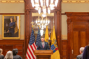 NJDOBI Commissioner Justin Zimmerman speaks at the State House