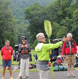 Delaware River Sojourn safety leadJacqui Wagner gave the mandatorysafety talk each day. The safety teamwas made up of volunteers from theNational Canoe Safety Patrol. Photoby the Delaware River Sojourn.