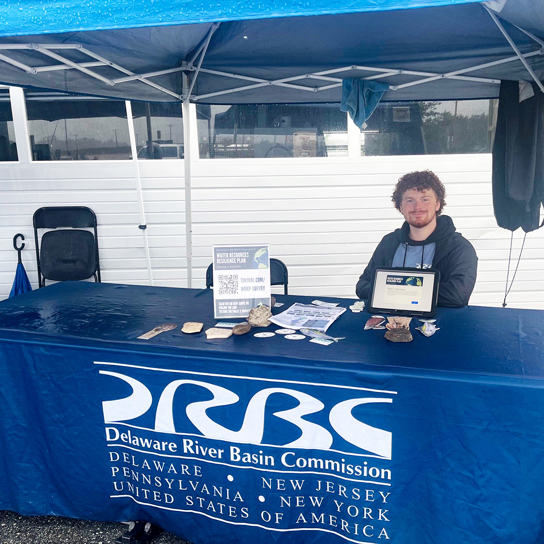 It also rained at Delaware Coast Day, but that didn't stop folks from visiting the DRBC table. Photo by the DRBC.