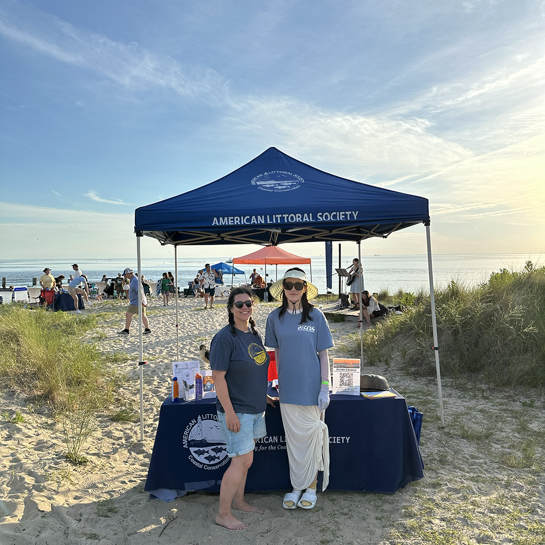DRBC intern Yutong Du (R) tables at Sunset on the Bay 2026. Photo by the DRBC.