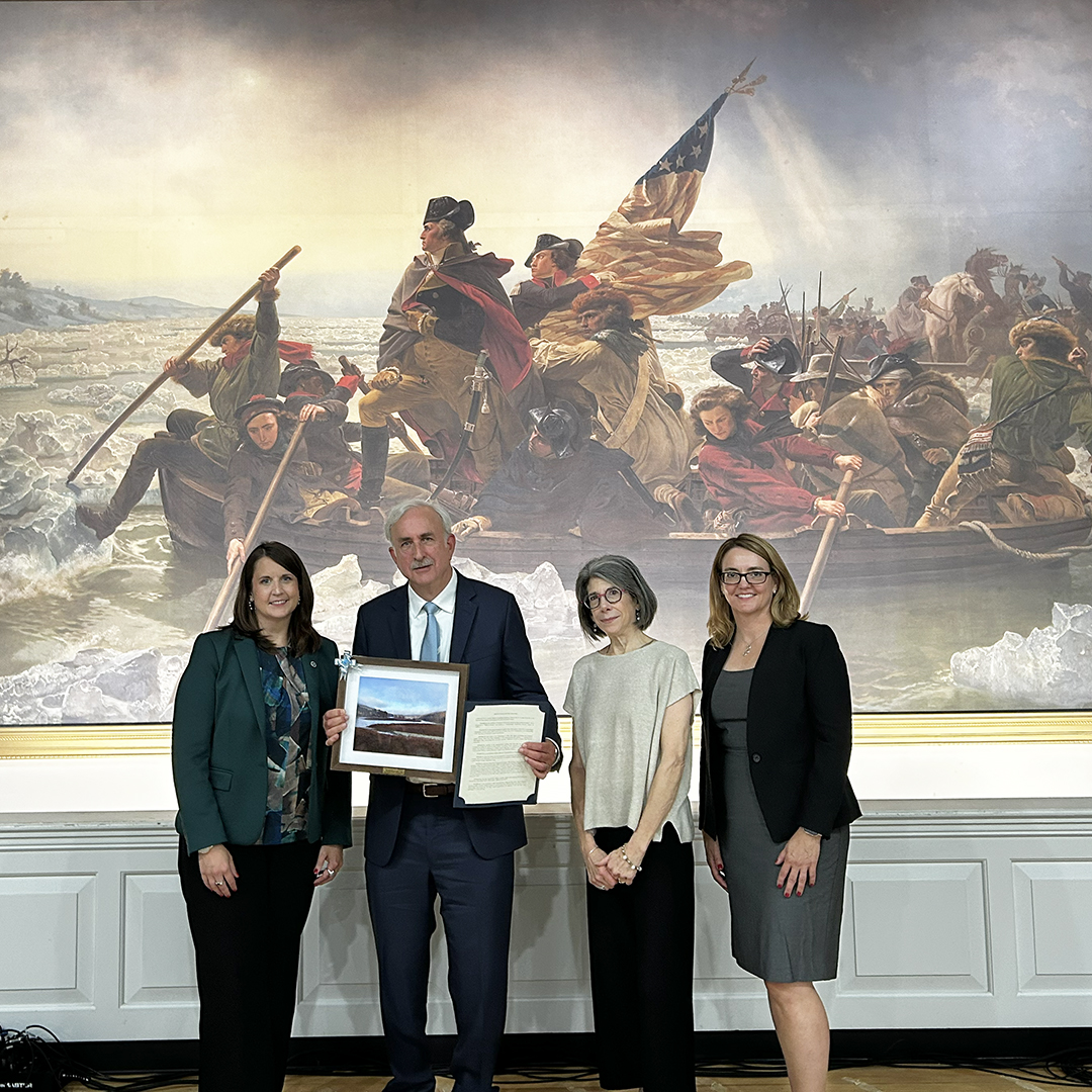 From L: Jill Whitcomb, PADEP and current DRBC Chair; Ken Warren, DRBC General Counsel; Pam Bush, DRBC; and Kristen Bowman Kavanagh, DRBC pose with the Resolution for the Minutes recognizing Ken Warren. Photo by the DRBC.