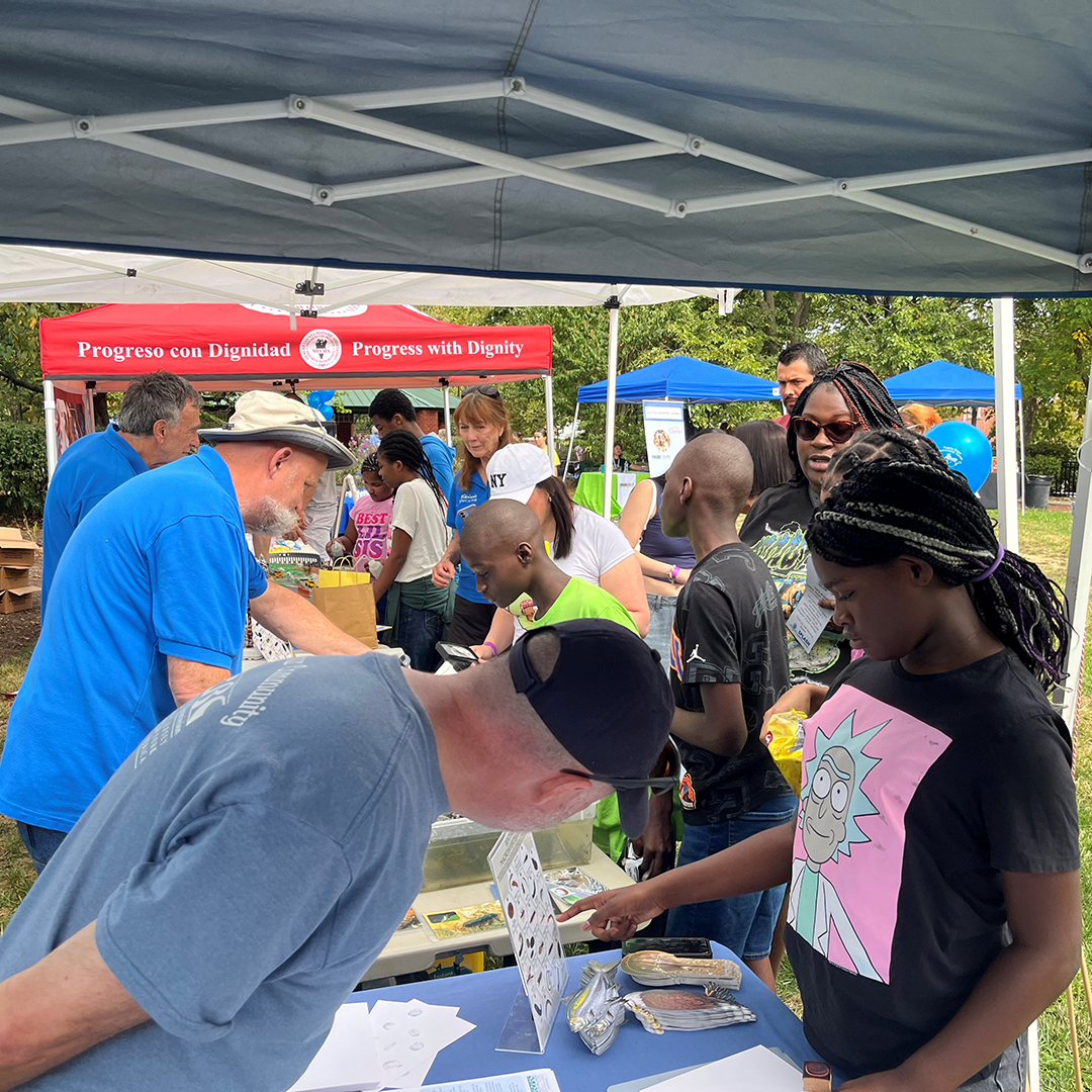 Folks stop by the DRBC table at TrentonRiver Days. Photo by the DRBC.