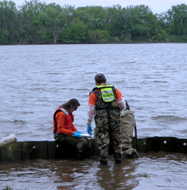 USGS Hydrographers Kathryn Cahalane, Jacob Gray and Daniel Skulski record data at the site location. Photo by the DRBC.