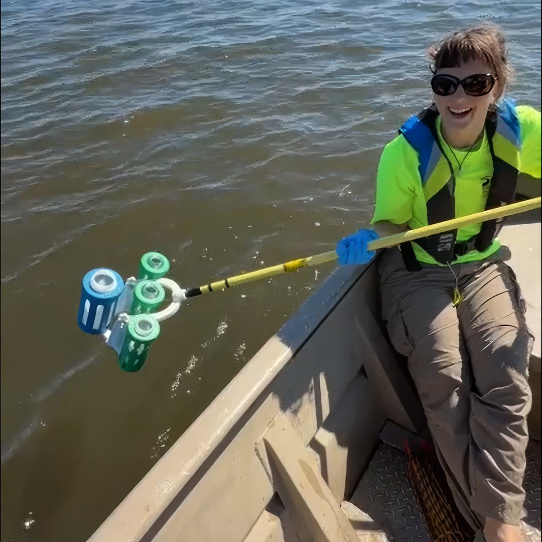 DRBC staff collects a water sample to monitor for bacteria. Photo by the DRBC.