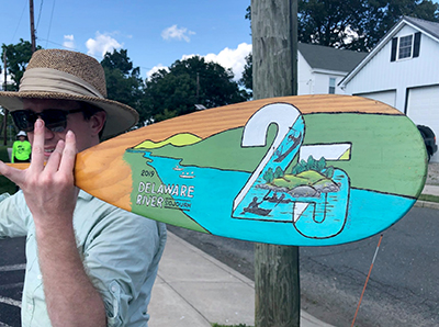 This year's paddle incorporates the Sojourn's Tshirt design by Dejay Branch and was created by Sandy Schultz. Photo by Michelle Mormul.