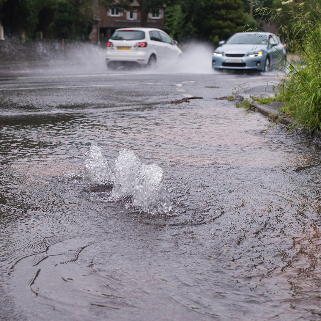 Adobe Stock image of a water main break. 