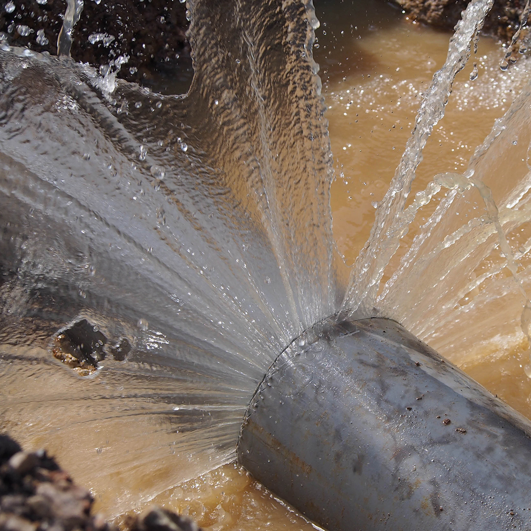 Adobe Stock image of a leaky water pipe.