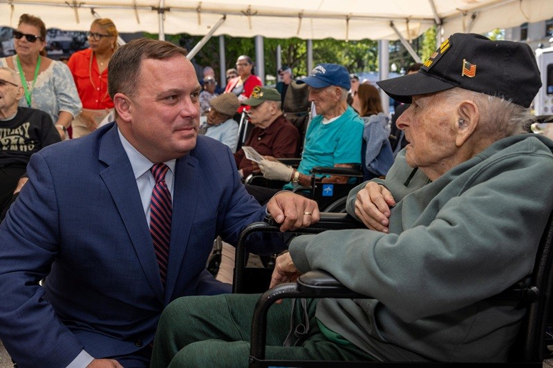Commissioner Vincent Solomeno meets Melvin Sher, Army Air Force Veteran, one of the World War II Veterans honored in recognition of the 82nd Anniversary of D-Day.