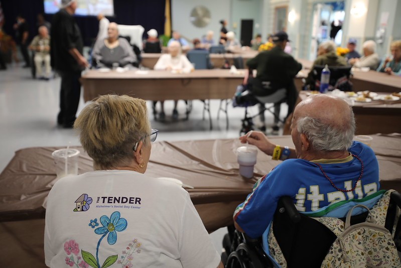 Veterans at the Vineland Home sitting around tables enjoying autumn classics such as apple pie, apple cider and pumpkin pie, and apple nachos!