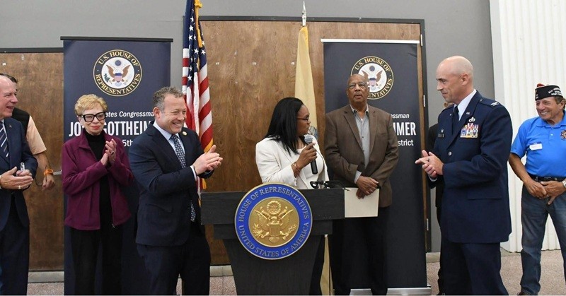 Esther Chucaralao, Deputy Commissioner of Veterans Affairs, speaking at the 100th birthday celebration of World War II hero U.S. Army Sgt. August 