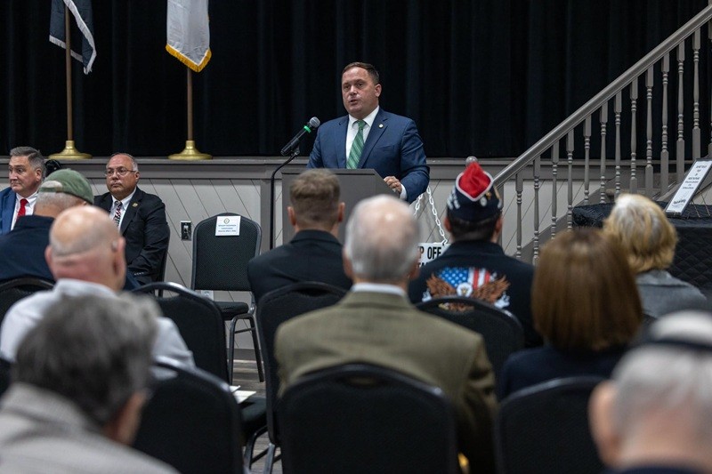 Commissioner Solomeno speaking at the medal ceremony event.
