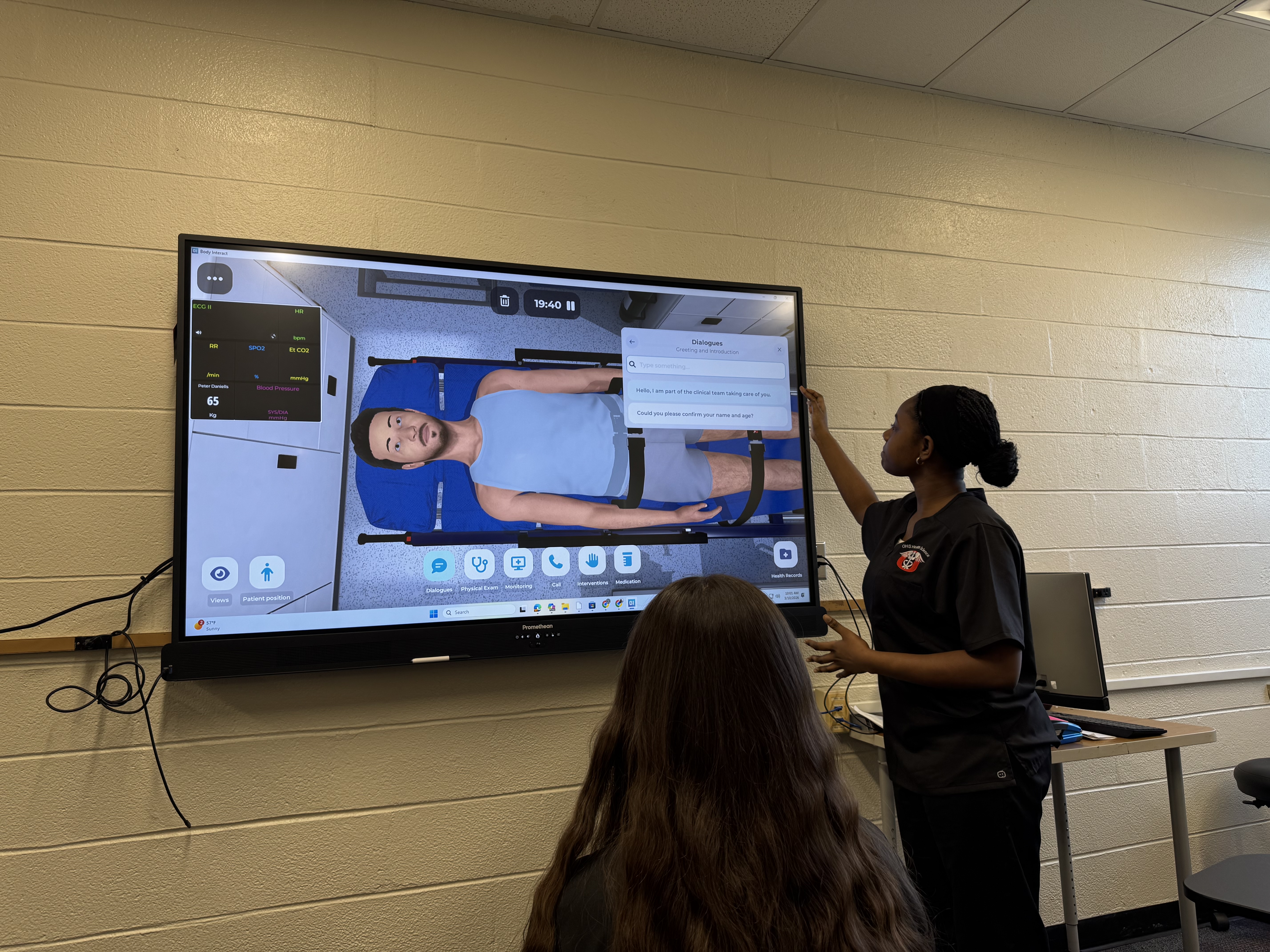 student interacting with screen