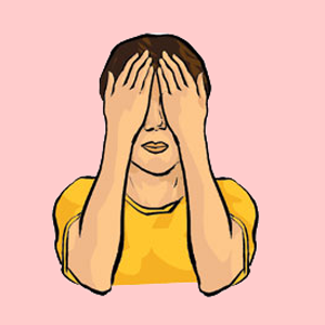 A woman coving her eyes with her palms
