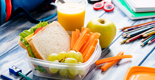 a collection of lunch foods for a child