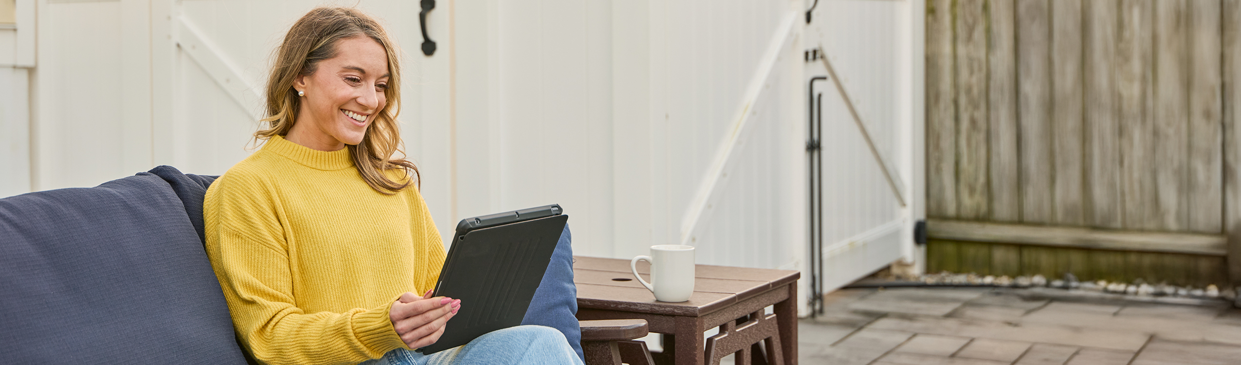 photo: woman with computer outside