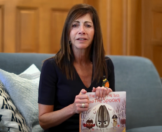 Photo of First Lady reading the book The Bad Seed Presents: The Good, the bad, and the Spooky