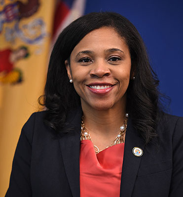 photo of Lieutenant Governor Lieutenant Governor Tahesha Way, Esq.  New Jersey Lieutenant Governor and Secretary of State  Tahesha L. Way serves as New Jersey’s 3rd Lieutenant Governor. She was appointed to the position by Governor Phil Murphy on September 8, 2023. A lifelong public servant, Lieutenant Governor Way has devoted her entire career to improving the lives of her fellow New Jerseyans. Over the past two decades, she has served at numerous levels of local and state government.  As Lieutenant Governor, Ms. Way brings her extensive experience to bear on addressing the greatest challenges facing New Jerseyans — from making life more affordable, to protecting fundamental freedoms—like access to reproductive health care and equality under the law — to maintaining New Jersey’s reputation as the best and safest state to raise a family.  In addition to her role as Lieutenant Governor, Ms. Way also serves as New Jersey’s 34th Secretary of State — a position she has held since the beginning of the Murphy Administration.   As Secretary of State, Ms. Way leads one of the nation’s oldest constitutional offices and directs a department with a diverse portfolio. In her capacity as New Jersey’s top election official, she has overseen the state Division of Elections and its work in securing our democracy and ensuring broad, fair access to the right to vote. Lieutenant Governor Way also chaired New Jersey’s Complete Count Commission, a 27 member non-partisan commission established to achieve a complete count in the 2020 US Census. In addition to the critical work protecting what Lieutenant Governor Way calls the “fraternal twins of democracy,” she also oversees the state government offices supporting New Jersey’s vibrant arts, culture, history, and business communities. Under her leadership, the state’s tourism economy has generated record-high revenues.  Following her 2022-2023 service as the first Black person and first Secretary from New Jersey to lead the National Association of Secretaries of State (NASS) as President, Lieutenant Governor Way continues to serve on the NASS Executive Board as Immediate Past President. Prior to joining the Murphy Administration, Lieutenant Governor Way was an Administrative Law Judge for the State of New Jersey. In 2006, Lieutenant Governor Way was elected to the Passaic County Board of Chosen Freeholders and served as the Freeholder Director in 2009. She served as Special Counsel for the Passaic County Board of Social Services overseeing all agency litigation. She also served as a Council Member for the New Jersey Highlands Water Protection and Planning Council.  She is the former President of the Women Empowered Democratic Organization of Passaic County, an organization dedicated to empowering Democratic women by increasing their participation with the goal of achieving greater equality in the political process. Lieutenant Governor Way also previously served on the Board of Directors for the Institute for Women’s Policy Research, a leading national think tank geared towards advancing dialogue and policy for improving women’s lives and their families. Lieutenant Governor Way is a graduate of Brown University, where she served as Vice President of the collegiate chapter of the NAACP, President of the Iota Alpha chapter of Alpha Kappa Alpha Sorority, Inc. taught religious education, and was a radio announcer for WBRU-FM. She holds a J.D. from the University of Virginia School of Law at Charlottesville, where she clerked for the Virginia Legal Aid Society and the United Steelworkers of America. Lieutenant Governor Way lives in Wayne, New Jersey with her husband Charles and their four children Fallon, Farrah, Faythe, and Fiona. She was raised in the Bronx by her late parents, Robert and Rosa Wright, who also devoted their careers to public service as employees with the New York City Transit Authority.  Lieutenant Governor Way has been a member of the New Jersey State Bar Association, Garden State Bar Association, National Association of Women Judges, Association of Black Women Lawyers, Passaic County Bar Association, and the New Jersey Women’s Lawyers Association.