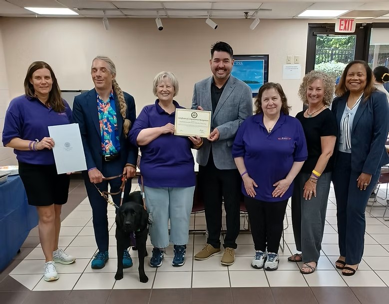 DB CAN NJ Board Trustees pose with CBVI's Executive Director and Assistant Division Director and the Legislative Aide for US Senator Andy Kim while holding the 2025 Governor's Proclamation for Deafblind Awareness Week, and the US Congress Citation for 10 years of dedicated service to the community.