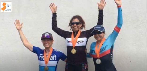 Michelle Bernich with a gold medal with other two medal winners