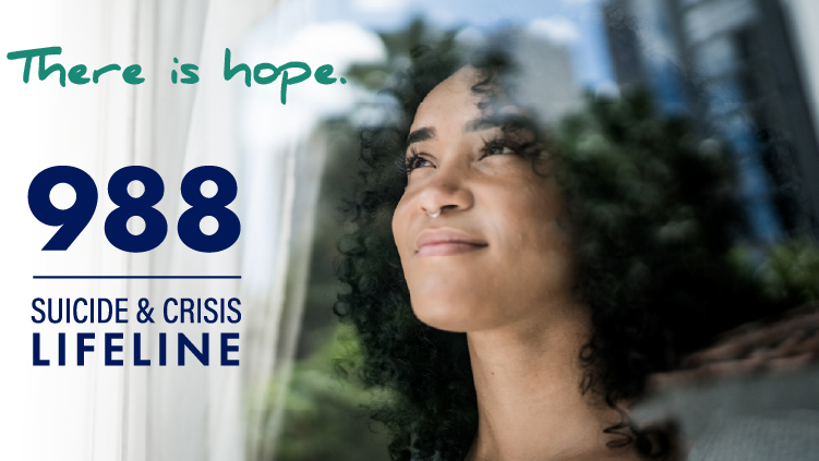 Woman is looking through the window - mobile version