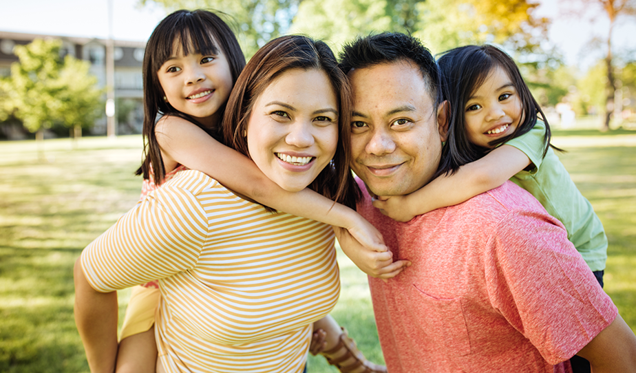 photo: Stock photo - Family, parents with two girls