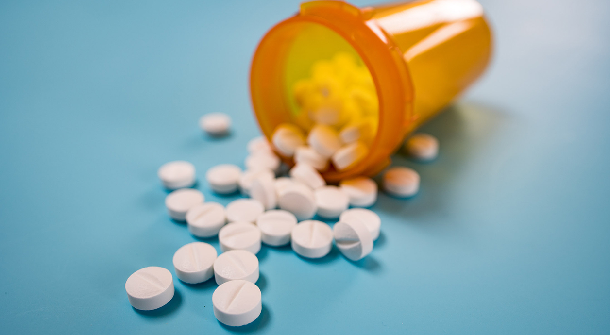 Open bottle of pills
