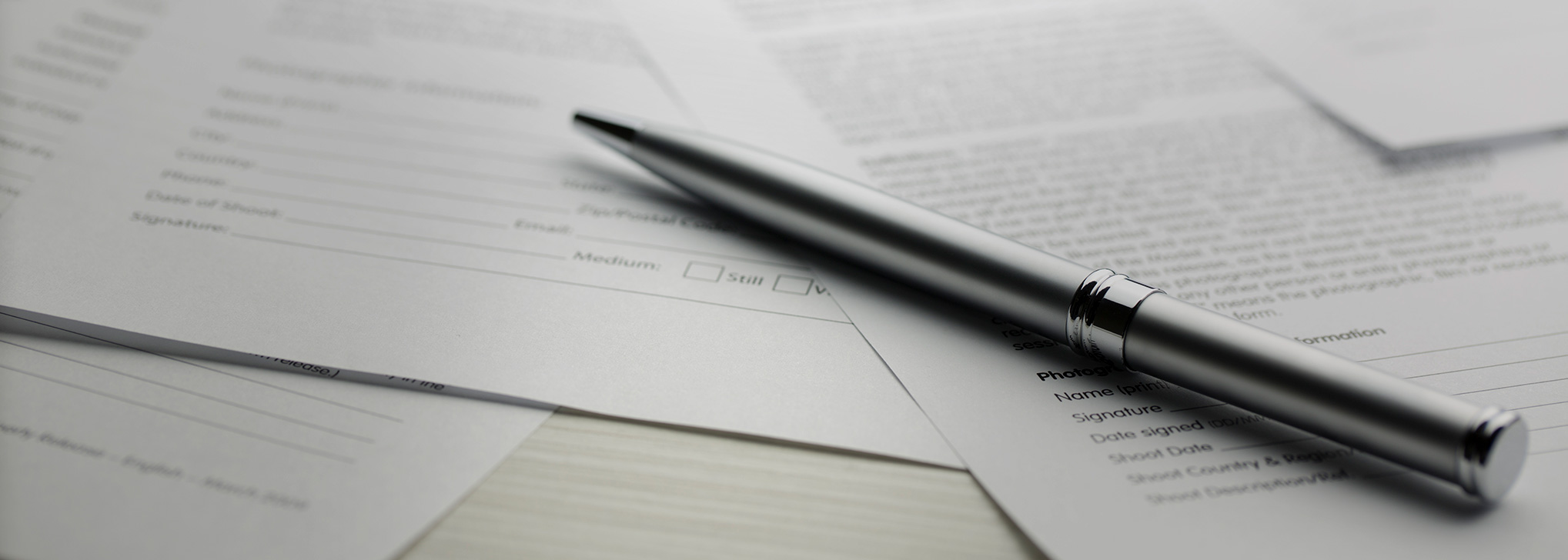 A pen on the documents