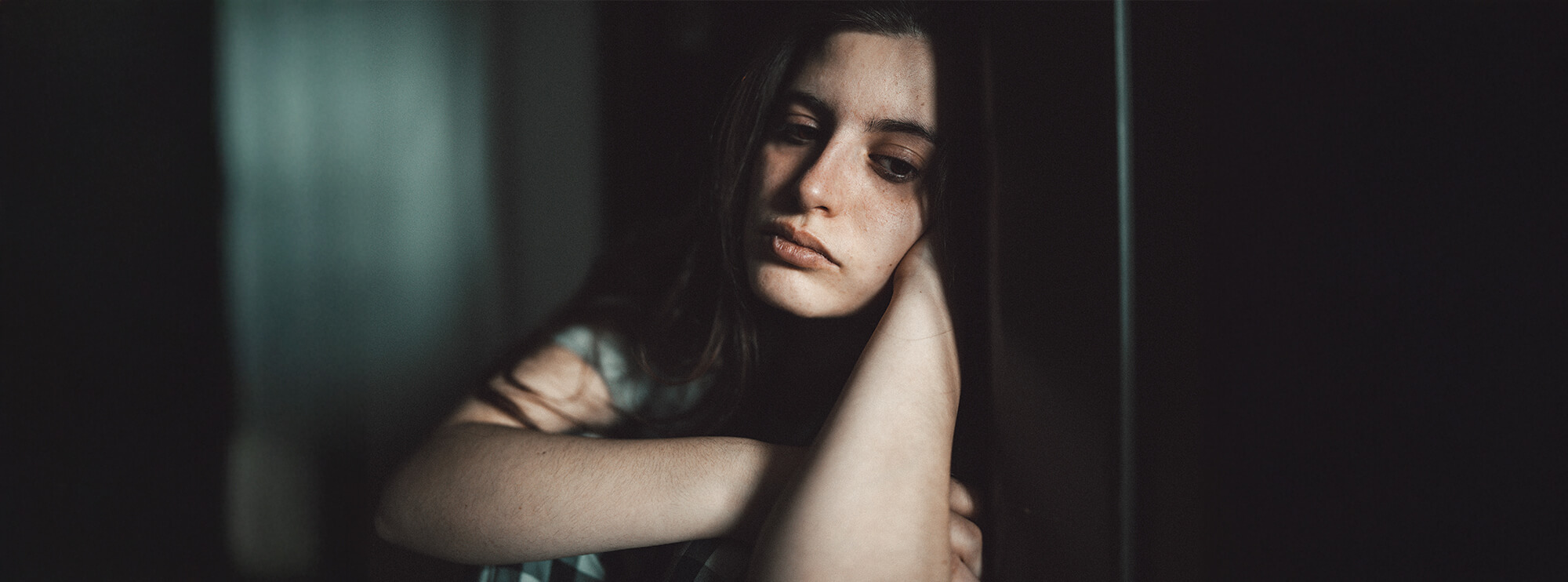 A woman that's looking depressed