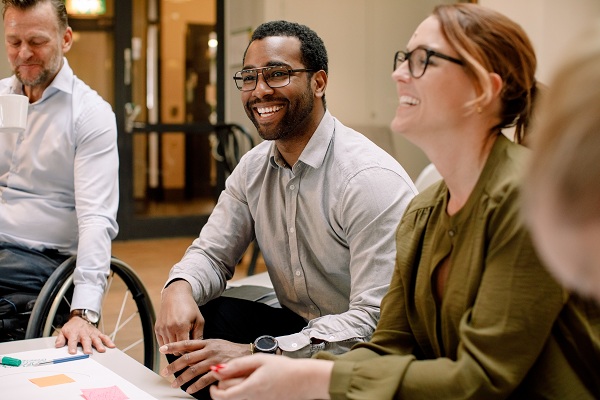 Man in group smiling