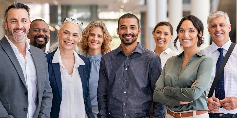 Group of professionals posing for picture