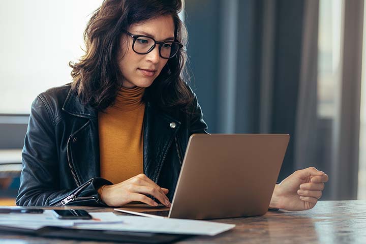 woman at a desk with computer