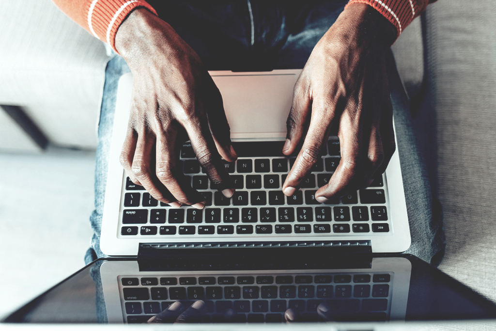 man using a laptop computer