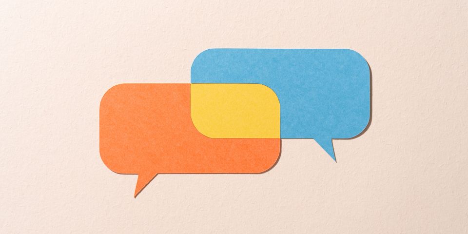 two overlapping speech bubbles conveying the concept of translating languages