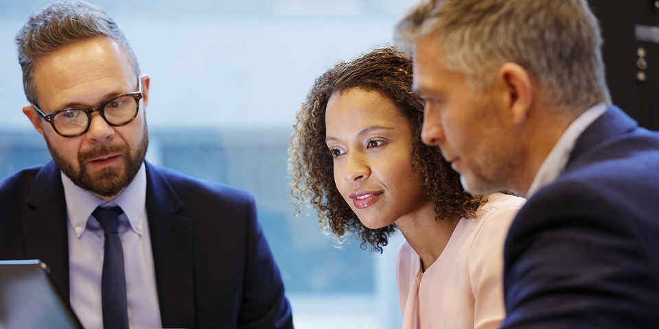 Advisior having a meeting with couple