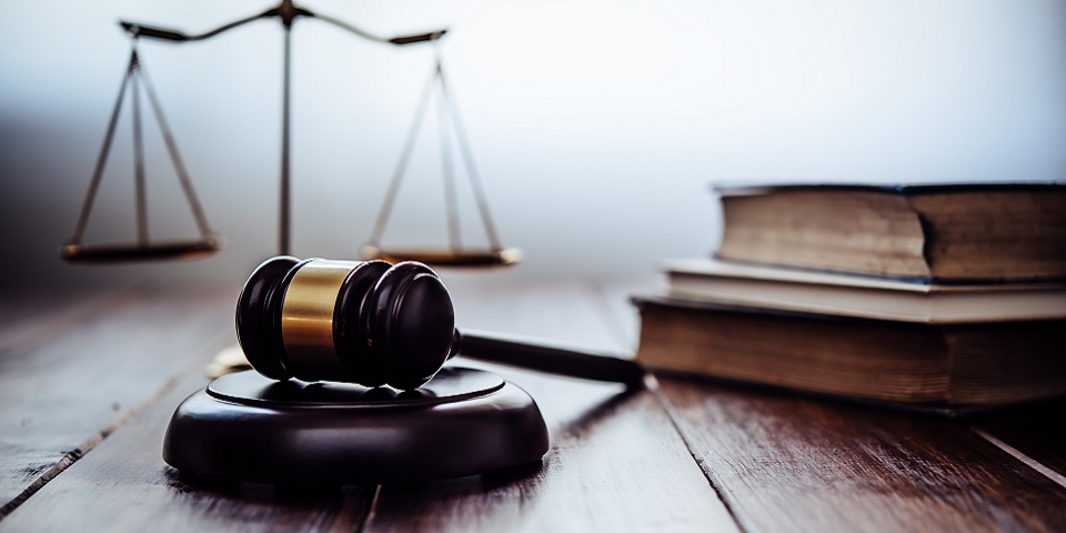 Close-up of gavel on table