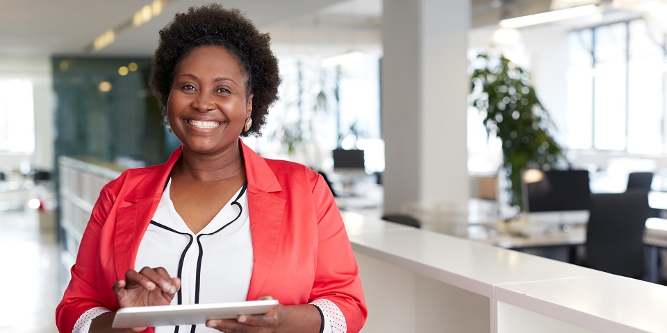 Female professional smiling at office