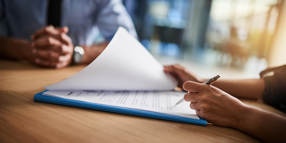 Woman completing form