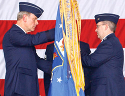 Maj. Gen. Clark Martin (left), Commander, New Jersey Air National Guard passes the colors to Col. Michael L. Cunniff (right), the new commander of the 108th. Photo by Tech. Sgt. Martin Hovath, 108ARW/MultiMedia Center.