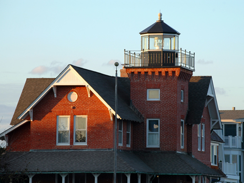 The sun begins to set on the Sea Girt Lighthouse, Monmouth County