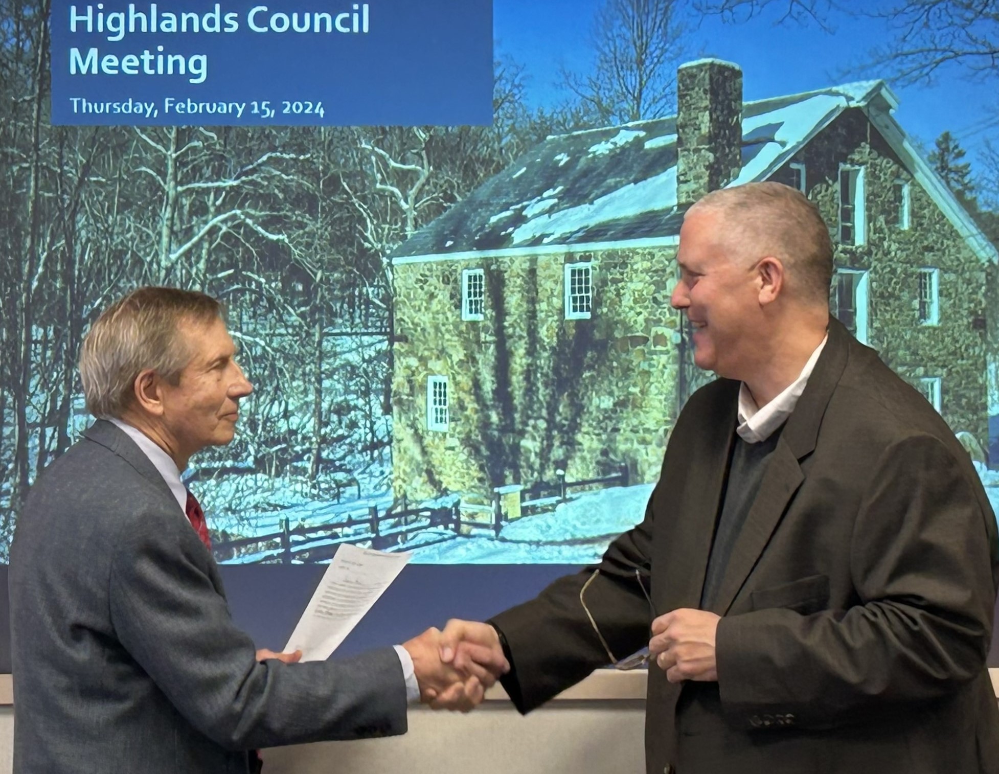 two men shaking hands