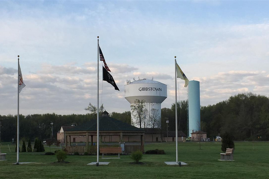 flags and a wwater tower