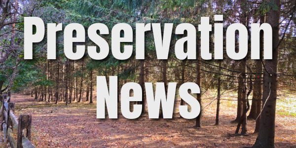 A picture of the Tucker Farm with the words "preservation news" over-layed