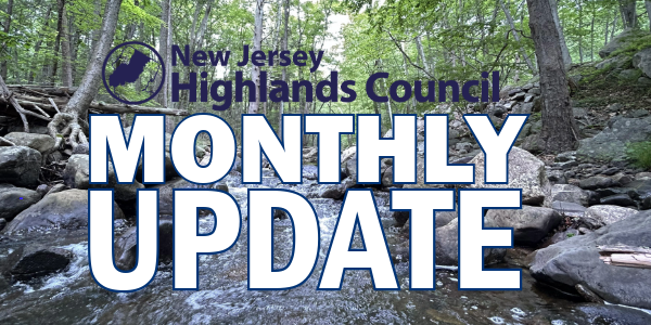 A picture of a river and the words "Monthly Update" overlaid