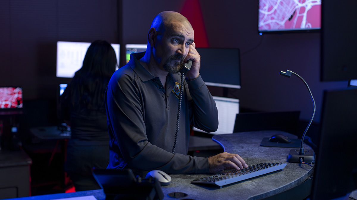 photo: parole office on the phone in the command center
