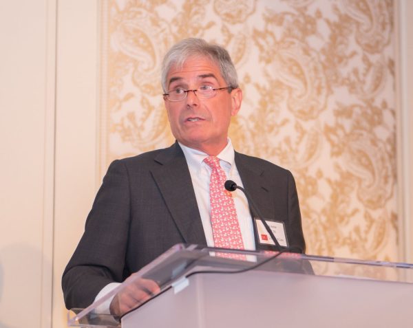 photo: Bruce Keller behind a podium