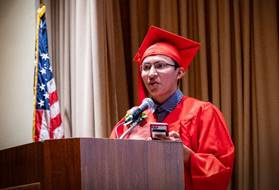 Miguel Hernandez-Delgado addresses the graduation as Class Speaker.